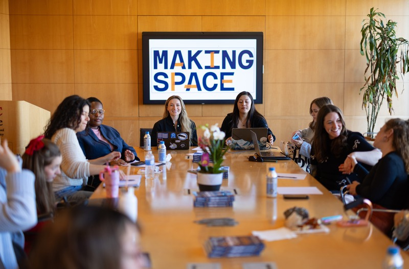 A team of Disabled professionals collaborating around a table at Making Space